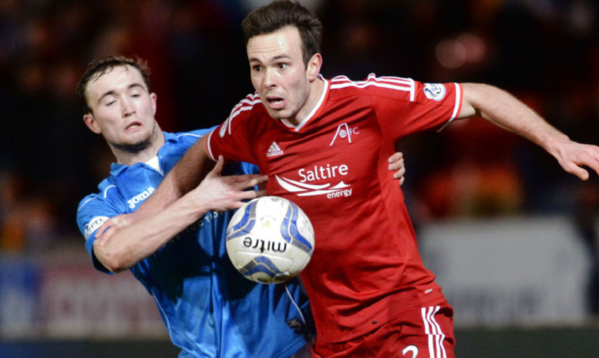 Andrew Considine in action against St Johnstone previously.