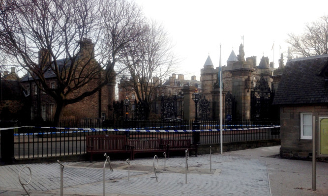 Police investigate after a 27-year-old man was attacked behind the Palace of Holyrood House in Edinburgh.