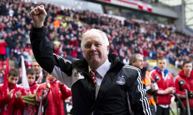 Outgoing Aberdeen manager Craig Brown salutes the fans at full time after a win in his last game in charge at Pittodrie.