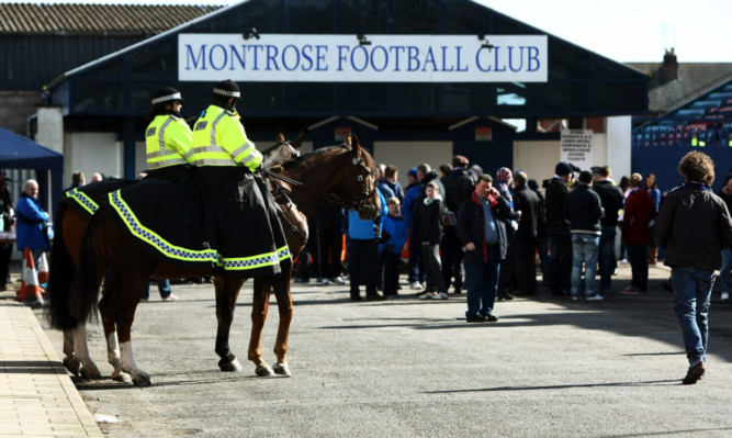 Police horses patrolled outside Links Park in Montrose prior to the game with Rangers.