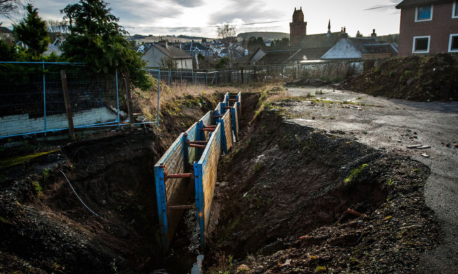 The hole, which was caused by flooding, in the car park of the Wheel Inn, Scone.