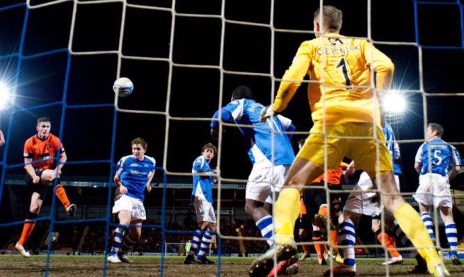 St Johnstone's Liam Craig finds the back of the net to level the game late on.