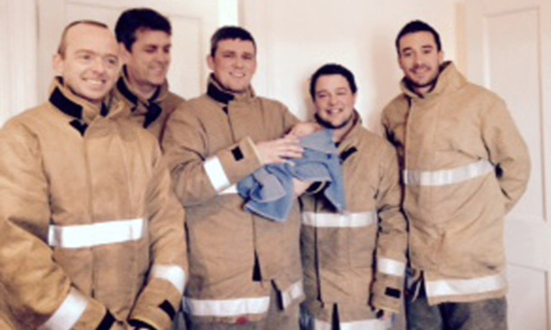 The firefighters were on hand to help deliver the youngster.