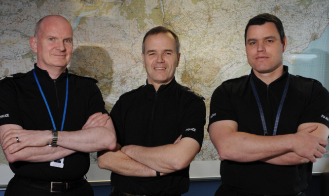 New era  Chief Superintendant Hamish MacPherson (divisional commander of D Division), Mr House and Chief Inspector Conrad Trickett.
