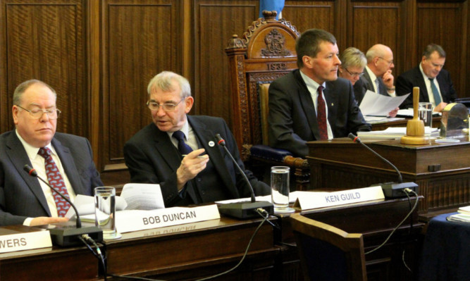 Last years council budget meeting at the City Chambers, top. This years meeting is likely to be highly charged.