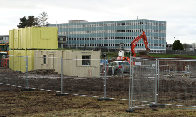The construction of the new Forfar Community Campus, with Forfar Academy in the background.