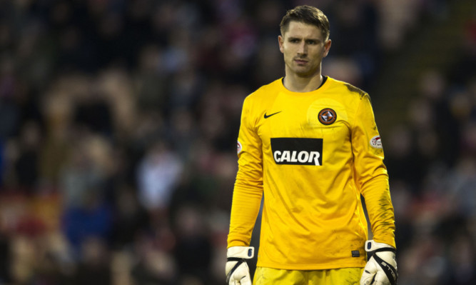 Radoslaw Cierzniak in action for Dundee United.