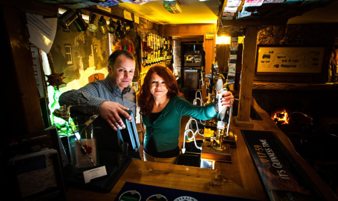Beer and spirits: Rab and Susan Wallace.