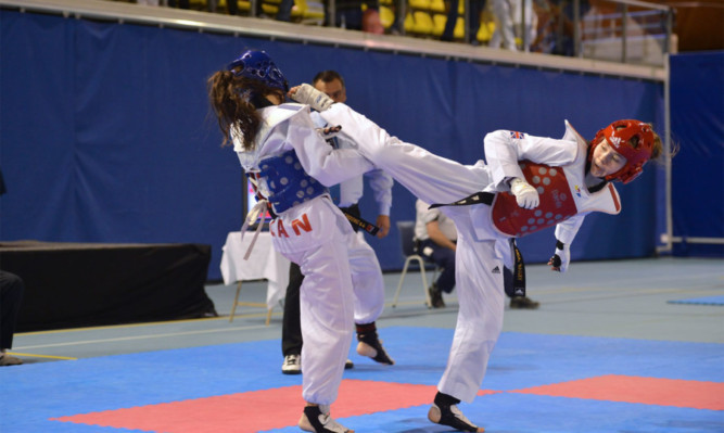 Asia Bailey (in red) in action at the Dutch Open.