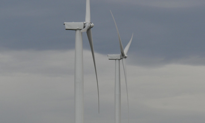 Kim Cessford - 06.11.12 - FOR FILE - pictured are two of the turbines in the wind farm next to Mossmorran, Fife showing an articulated lorry at it's base for scale