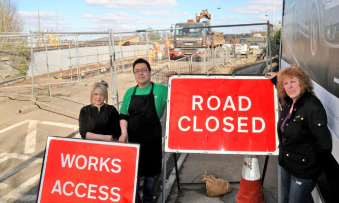 Representatives of businesses that are affected by the closure of the bridge: Leanne Cameron, from Rachels Hair and Beauty; Alan Chan, China China Restaurant; and Lynn Morton, of Johns Corner Shop.