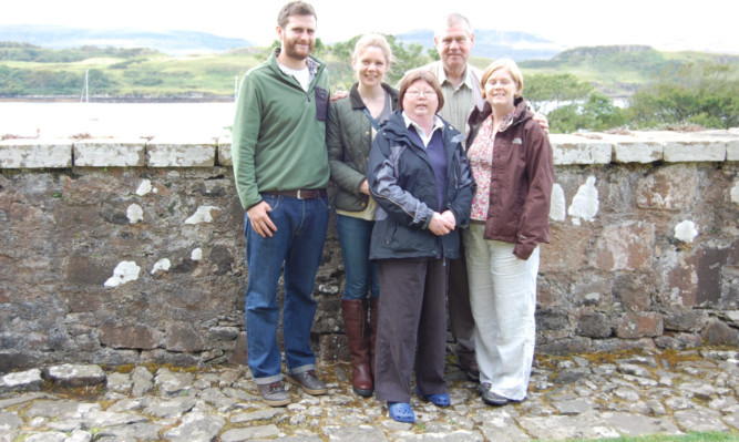 (From left) Gerry McAllister, the couples youngest daughter Viki Thompson, Lesley, Richard and the couples eldest daughter Jenny at Dunvegan Castle in August last year.