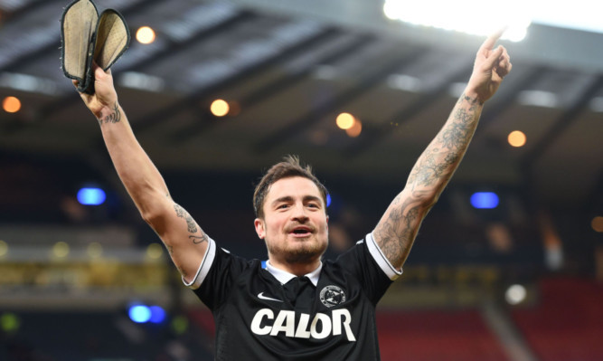 Paul Paton celebrates at full-time.