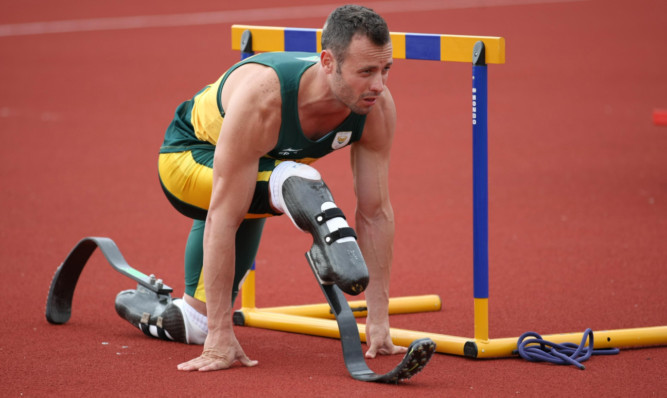 File photo dated 27/08/2012 of South Africa's Oscar Pistorius. PRESS ASSOCIATION Photo. Issue date: Wednesday April 3, 2013. Oscar Pistorius is ready to return to training as a way of dealing with his grief but has no immediate plans to compete, his agent Peet van Zyl confirmed today. See PA story ATHLETICS Pistorius. Photo credit should read: Chris Radburn/PA Wire