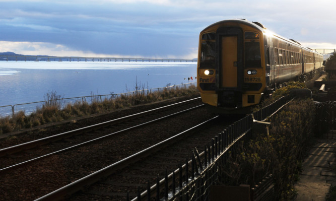 The stretch of rail track at Broughty Ferry where a man stopped a train by standing on the line and waving his arms.