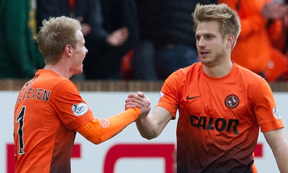 15/03/14 SCOTTISH PREMIERSHIP
DUNDEE UTD V ST MIRREN (3-2)
TANNADICE - DUNDEE
Stuart Armstrong (right) is congratulated by team mate Gary Mackay-Steven after scoring to bring Dundee Utd back on level terms at 2-2