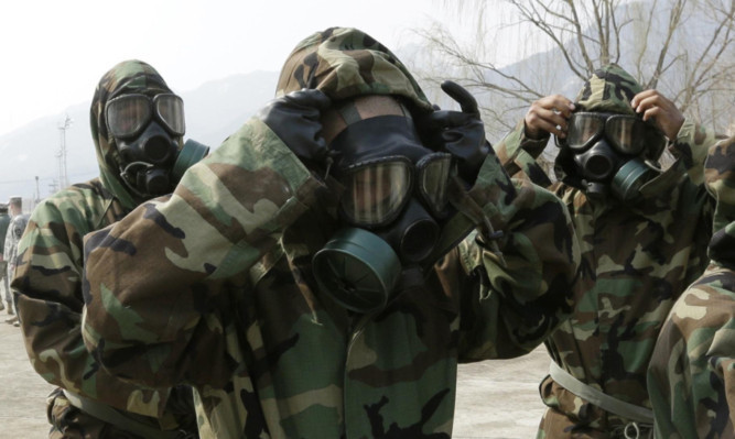 Soldiers of the US Army 23rd chemical battalion, based in Uijeongbu, South Korea, test their equipment.