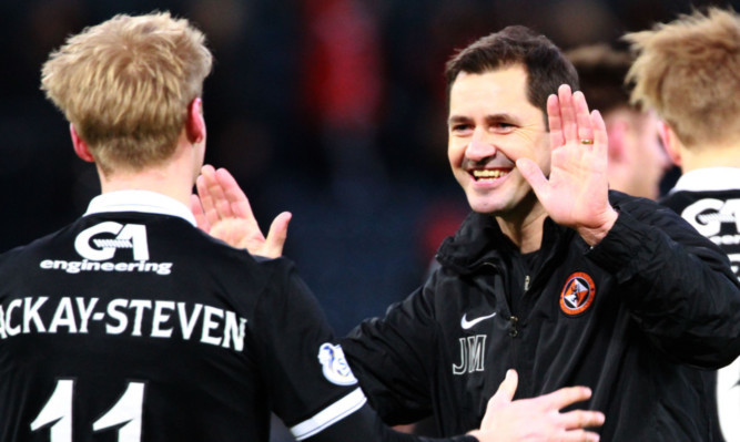 Jackie McNamara celebrates at the end of Saturday's League Cup semi-final win over Aberdeen with Gary Mackay-Steven.