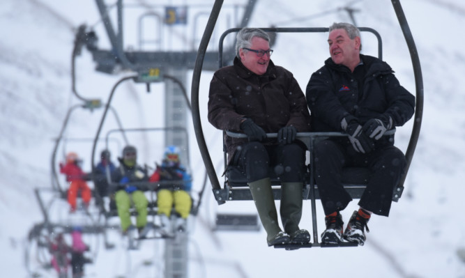from left: Enterprise and Tourism minister Fergus Ewing with Financial Director of the Glenshee Ski Centre Stewart Davidson announced a major snowsport infrastructure investment.
