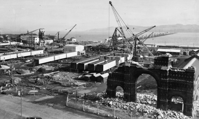 The Royal Arch midway through its demolition in 1964.