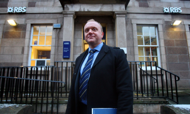 Detective Sergeant Murray Coull outside the RBS branch in Kirriemuir.