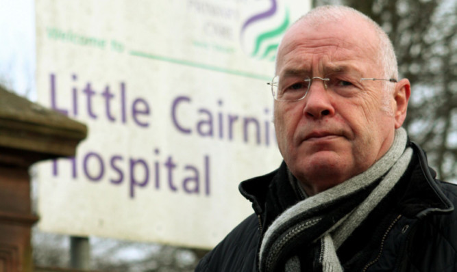 Councillor David Fairweather outside the hospital.