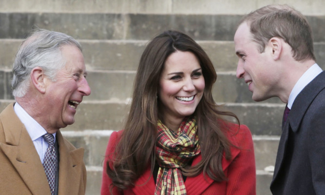 Kate laughs with Charles and William.