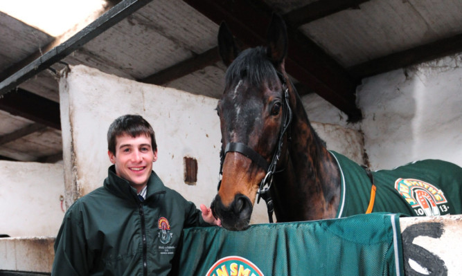 Jockey Ryan Mania with his Grand National winning horse Auroras Encore.