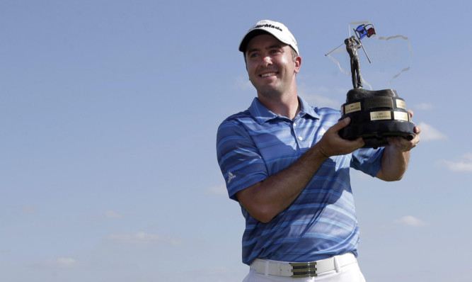 Martin Laird with the winner's trophy.