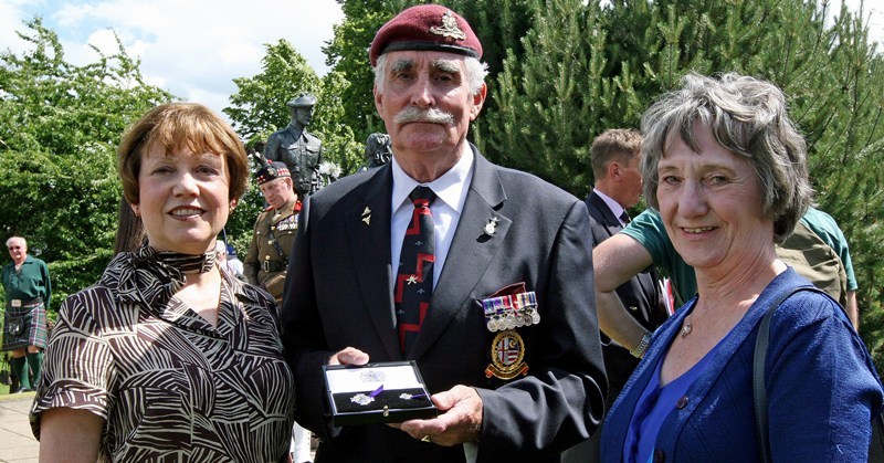 Kim Cessford, Courier - 02.07.10 - presentation of Elizabeth Cross medals at the North inch as part of the Perth Day Celebrations - Eleanor and George Hind with Liz Mathewson with the Elizabeth Cross medal awarded to Lance Corporal David Hind of the Royal Highland Fusiliers who was killed on the 2nd of January 1977 in Northern Ireland