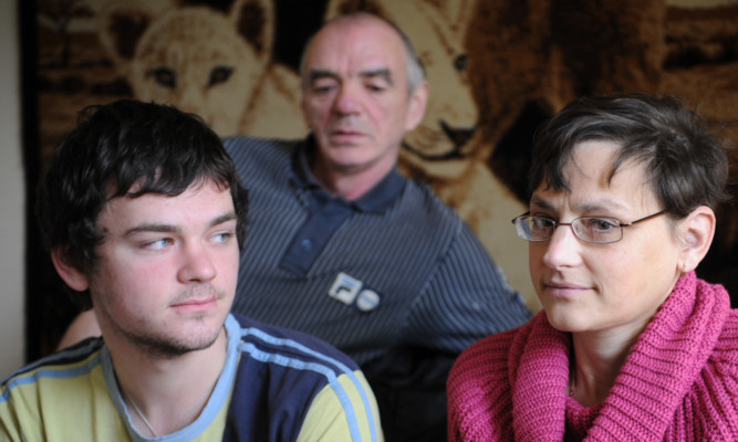 Donna and Jamie McMurchie with John's brother Bruce (rear).