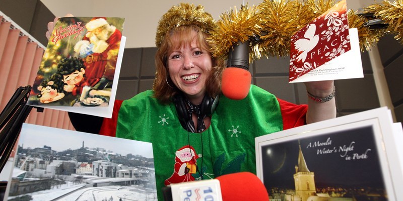 Steve MacDougall, Courier, Perth FM Radion Station, Moncrieff Business Centre, Frairton, Perth. Better late than never, as christmas cards finally arrive at the radio station, 7 months late! Pictured, Station Manager Heather McDonald, getting in the festive spirit thanks to the untimely delivery.