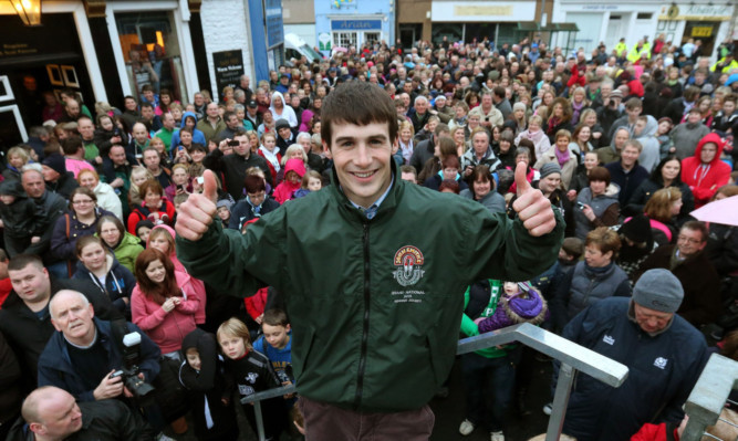 Ryan Mania is given a heros welcome in his home town of Galashiels as hundreds turned out to see the Grand National winning jockey.