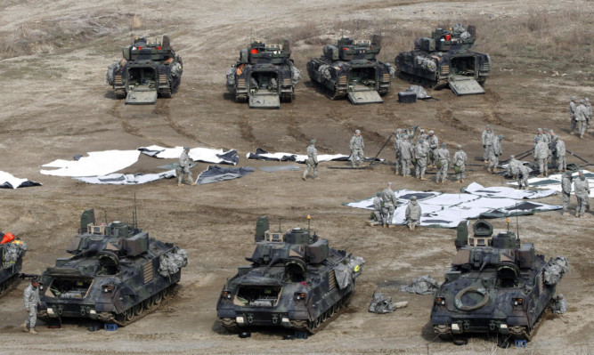 US Army soldiers prepare for an exercise during their annual military drills with South Korea.