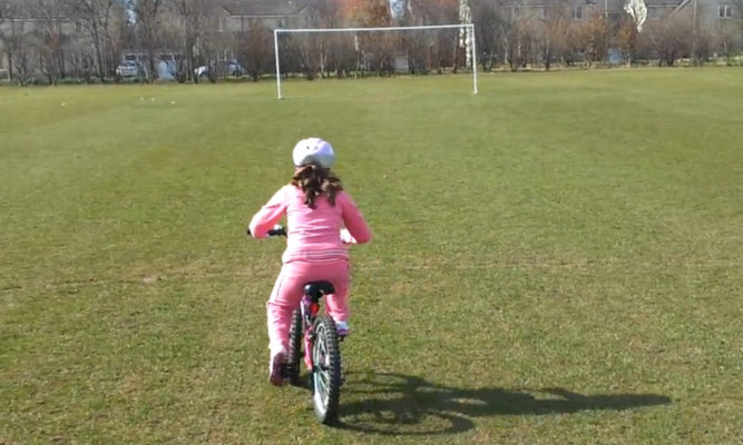 An image from the video of Brooke's cycle, posted by her proud parents.
