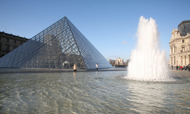 The pyramid over The Louvre in Paris. PRESS ASSOCIATION Photo. Picture date: Monday November 24, 2008. Photo credit should read: Martin Keene / PA.