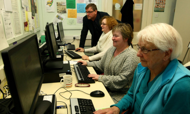 Councillor Bill Bowels with Cecilia Slater, Nicky Milne and Jean Ramsay at the Panmure Centre's Tuesday computer class.