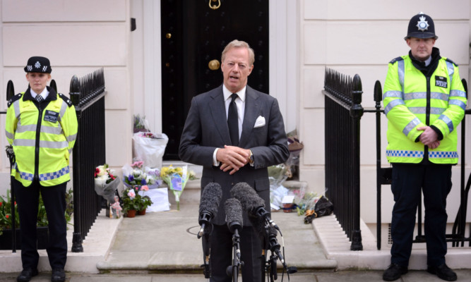 Sir Mark Thatcher speaks to the media outside his mothers home in Belgravia, central London.