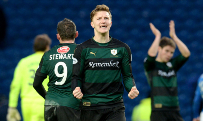 Paul Watson celebrates Raith's win over Rangers last week at full-time.