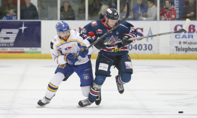 Stars Igor Gongalsky tussles with Flyers Ned Lukacevic during last weeks clash at Dundee.