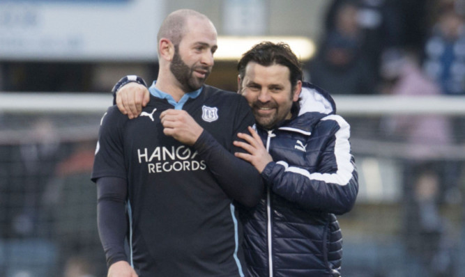 Dundee manager Paul Hartley celebrates with Gary Harkins (left)