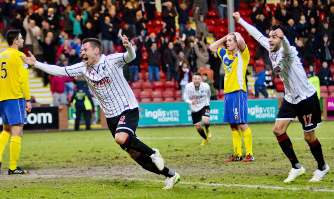 Andy Barrowman celebrates.