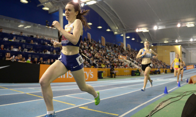 Laura Muir on her way to winning gold in the womens 1500 metres.