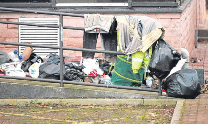 Some of the rubbish left behind by the Travellers.