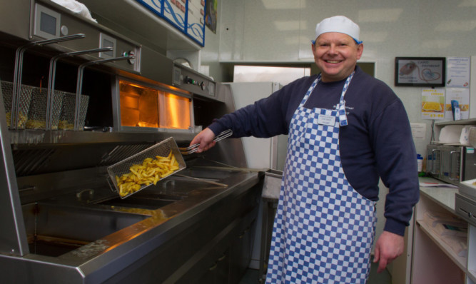 Stuart Atkinson in the North Street Chip Shop in Forfar, which has won an accolade for best chippy chips in Angus.