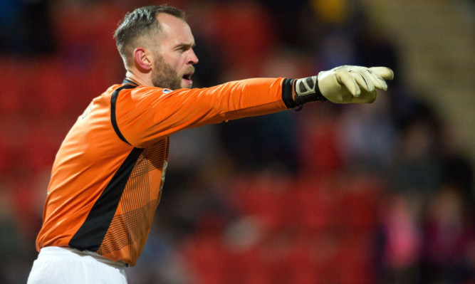 Alan Mannus.