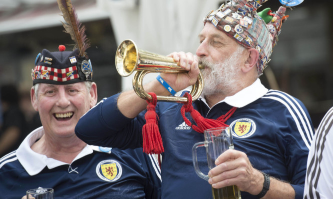 Members of the Tartan Army taking on fluids before a Euro 2016 qualifier in Germany last year.