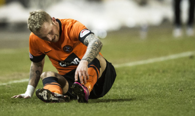 Johnny Russell was injured in a match against Inverness Caley Thistle in February.