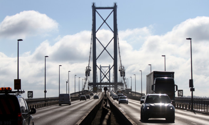 Kris Miller, Courier, 25/02/13. Picture today at River Forth crossings showstraffic travelling over the old Forth Road Bridge.