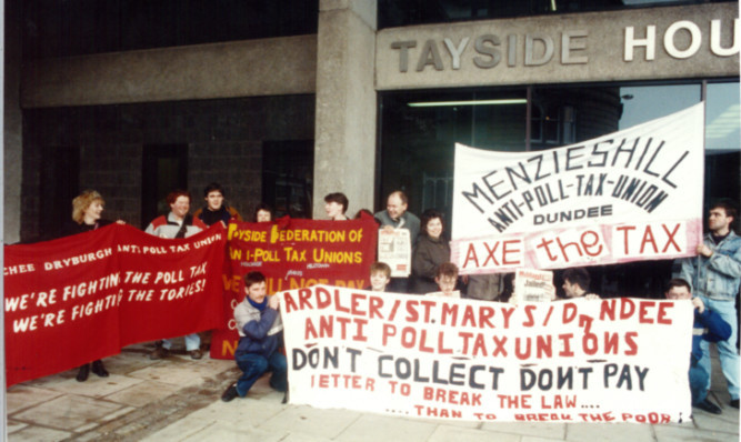 Campaigners protest against the poll tax in Dundee in 1990.